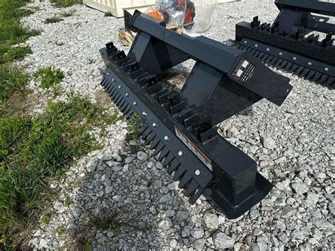 wolverine skid steer land leveler|skid steer tiller wolverine attachment.